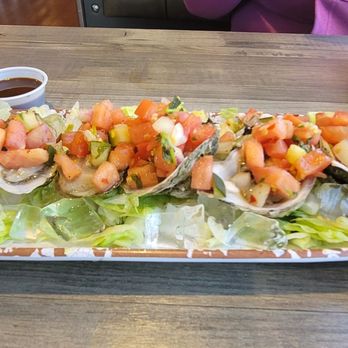 Costa Del Sol - Oysters on the half shell with pico de gallo - Sushi Bars Near Me - Louisville, Kentucky Costa Del Sol - Oysters on the half shell with pico de gallo - Sushi Bars Near Me - Louisville, Kentucky