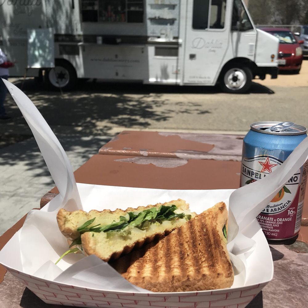 Dahlia Eatery - a sandwich and a can of soda - Food Trucks Near Me Dahlia Eatery - a sandwich and a can of soda - Food Trucks Near Me