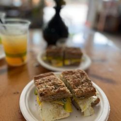 Kaya's - Breakfast egg sandwich with vegan Mayo, vegan pesto, avocado, on gluten free focaccia bread. Yummy!!!