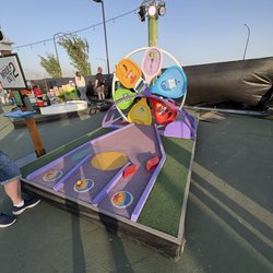 Pixar Putt - Broken pinwheel makes this hole useless. Sign on it says don't touch it.