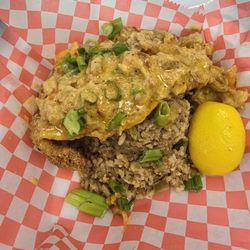Bayou City Swamp - Surf and Turf. Fish , Dirty Rice over Dirty Rice.