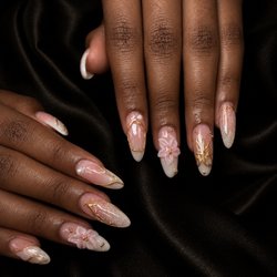 Pure Nails Spa - Soft pink, golden details & delicate florals -- a little luxury at your fingertips. Make your next set unforgettable at Pure Nails Spa.