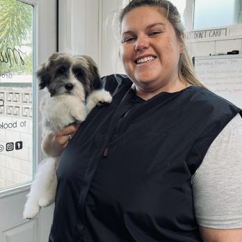 Mucky Pups - Our head groomer, Isabelle, with puppy Furby after his first groom - Pet Groomers Near Me - Waianae, Hawaii Mucky Pups - Our head groomer, Isabelle, with puppy Furby after his first groom - Pet Groomers Near Me - Waianae, Hawaii