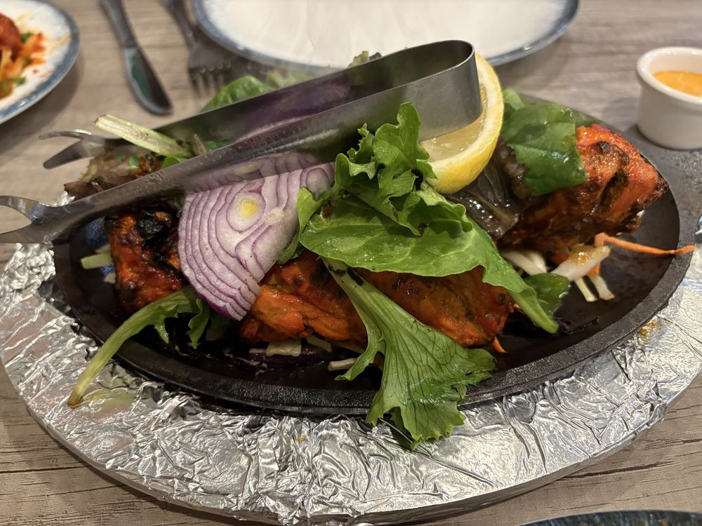 Nelmani Indian Cuisine Logo