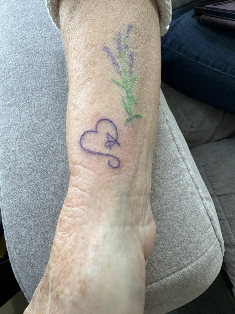 Living Arts Tattoo Logo