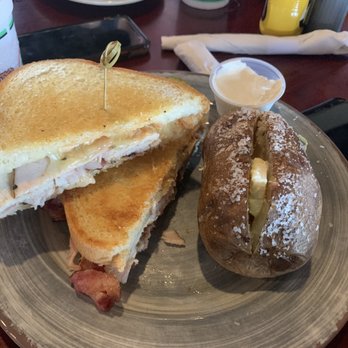 Dog Days Bar & Grill - Chipotle bacon turkey melt with baked potato - Bars Near Me - Osage Beach, Missouri Dog Days Bar & Grill - Chipotle bacon turkey melt with baked potato - Bars Near Me - Osage Beach, Missouri