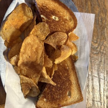 Ford's Garage Dearborn - Burnt End sandwich and kettle chips - Burgers Near Me - Dearborn, Michigan Ford's Garage Dearborn - Burnt End sandwich and kettle chips - Burgers Near Me - Dearborn, Michigan