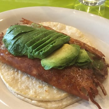 Chela & Garnacha - Grilled steak and onion taco with avocado & cheese - Mexican Near Me - Astoria, New York