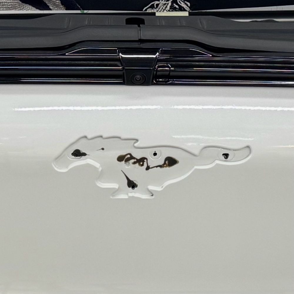 After my cars logo fell off you can see the glue they used to try and keep the logo on without me noticing. After my cars logo fell off you can see the glue they used to try and keep the logo on without me noticing.