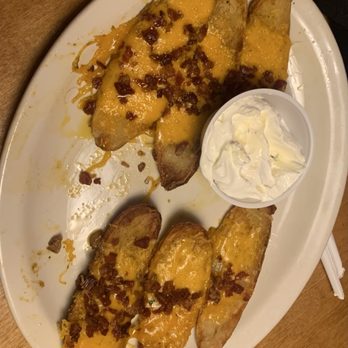 Texas Roadhouse - Appetizer potato skins with sour cream and bacon - Steakhouses Near Me - Manchester, New Hampshire Texas Roadhouse - Appetizer potato skins with sour cream and bacon - Steakhouses Near Me - Manchester, New Hampshire