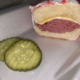 Pastrami sandwich w/ Mayo, mustard, cheese, and pickles on the side