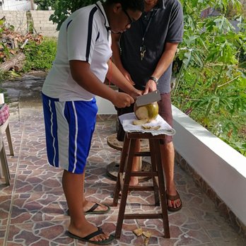 Coconut Revolution 101 - Cutting open a coconut - Historical Tours Near Me - Loiza, Puerto Rico
