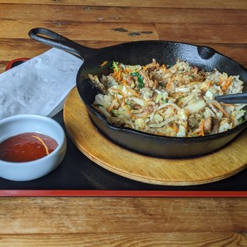 Mura Asian Eatery - Bibimbap served in cast iron skillet. - Japanese Near Me - Seattle, Washington Mura Asian Eatery - Bibimbap served in cast iron skillet. - Japanese Near Me - Seattle, Washington