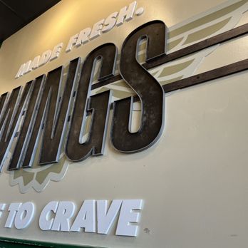 Wingstop - the sign for wings made to crave - Chicken Wings Near Me - Kingsport, Tennessee
