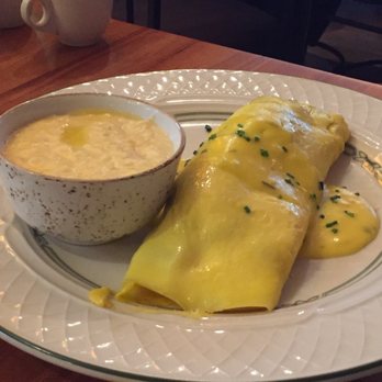 Big Jones - Omelette with crawfish, shrimp, cream cheese, and other goodies plus cheese grits on the side - Southern Near Me - Chicago, Illinois