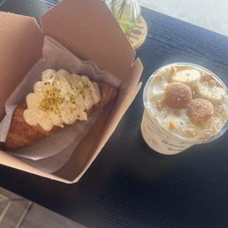 Pistachio croissant and banana latte Pistachio croissant and banana latte