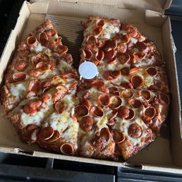 Had to have a piece before I took a pic! It was excellent, the box look a little greasy but the pizza was perfectly cooked! Had to have a piece before I took a pic! It was excellent, the box look a little greasy but the pizza was perfectly cooked!