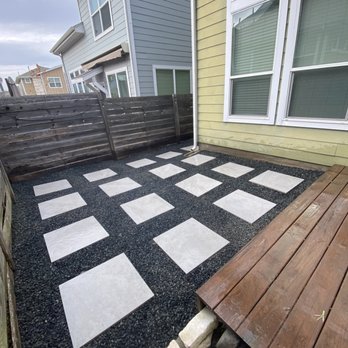 Longest Yard Landscape - Black star gravel with grey pavers. - Landscaping Near Me Longest Yard Landscape - Black star gravel with grey pavers. - Landscaping Near Me