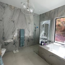 Surface Art Countertops - Primary Bath wrapped in Dolomite