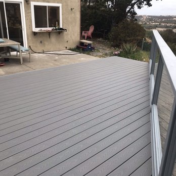 Aaction Builders - After. Composite decking wood framing. Glass in the railing. - General Contractors Near Me - San Diego, California