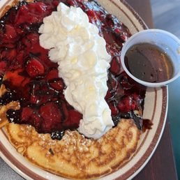 2 beautifully cooked large pancakes with strawberries, chocolate and whipped cream! My daughter loved it.