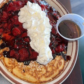 April’s Diner - 2 beautifully cooked large pancakes with strawberries, chocolate and whipped cream! My daughter loved it. - Diners Near Me - Newton, Iowa
