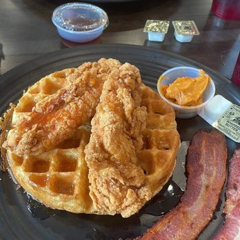 Piggy’s Deli & Pub - Chicken and Waffles with peach syrup and spicy butter. - Delis Near Me - Ashland, Virginia Piggy’s Deli & Pub - Chicken and Waffles with peach syrup and spicy butter. - Delis Near Me - Ashland, Virginia