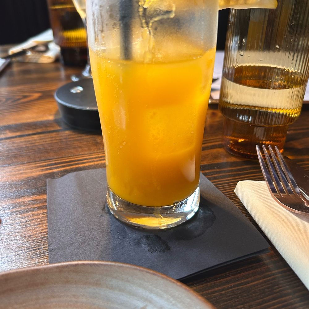 Mango Bay - Mango Bay mocktail - Caribbean Near Me - Brooklyn, New York Mango Bay - Mango Bay mocktail - Caribbean Near Me - Brooklyn, New York