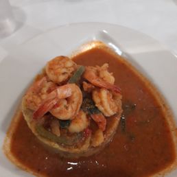 Mofongo con Camarones en salsa criolla. (Mashed green plantains with shrimp and creole sauce.) Mofongo con Camarones en salsa criolla. (Mashed green plantains with shrimp and creole sauce.)