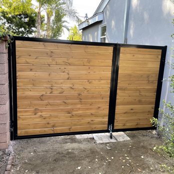 Socal Gates - Metal frame gate with "antique park" finish on the wood. - Fences & Gates Near Me - Orange, California Socal Gates - Metal frame gate with "antique park" finish on the wood. - Fences & Gates Near Me - Orange, California