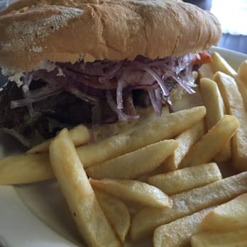 Tineo Peruvian Cafe - Pan con Chicharron (pork sandwich) - Peruvian Near Me - Richardson, Texas Tineo Peruvian Cafe - Pan con Chicharron (pork sandwich) - Peruvian Near Me - Richardson, Texas