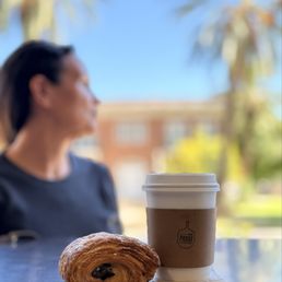 Perfect Saturday breakfast with a friend. Cappuccino and pain au chocolat.