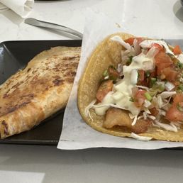 Gobernador marlin taco on the left, fish taco on the right Gobernador marlin taco on the left, fish taco on the right