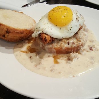 Paper Co Cafe - Biscuit with gravy and eggs. - Coffee & Tea Near Me - Houston, Texas Paper Co Cafe - Biscuit with gravy and eggs. - Coffee & Tea Near Me - Houston, Texas