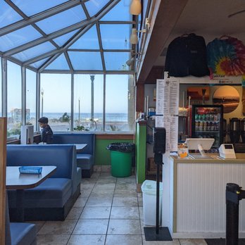 Breakers Breakfast, Brunch & Lunch - Inside, view of the beach from this corner. - Breakfast & Brunch Near Me - Pacifica, California Breakers Breakfast, Brunch & Lunch - Inside, view of the beach from this corner. - Breakfast & Brunch Near Me - Pacifica, California