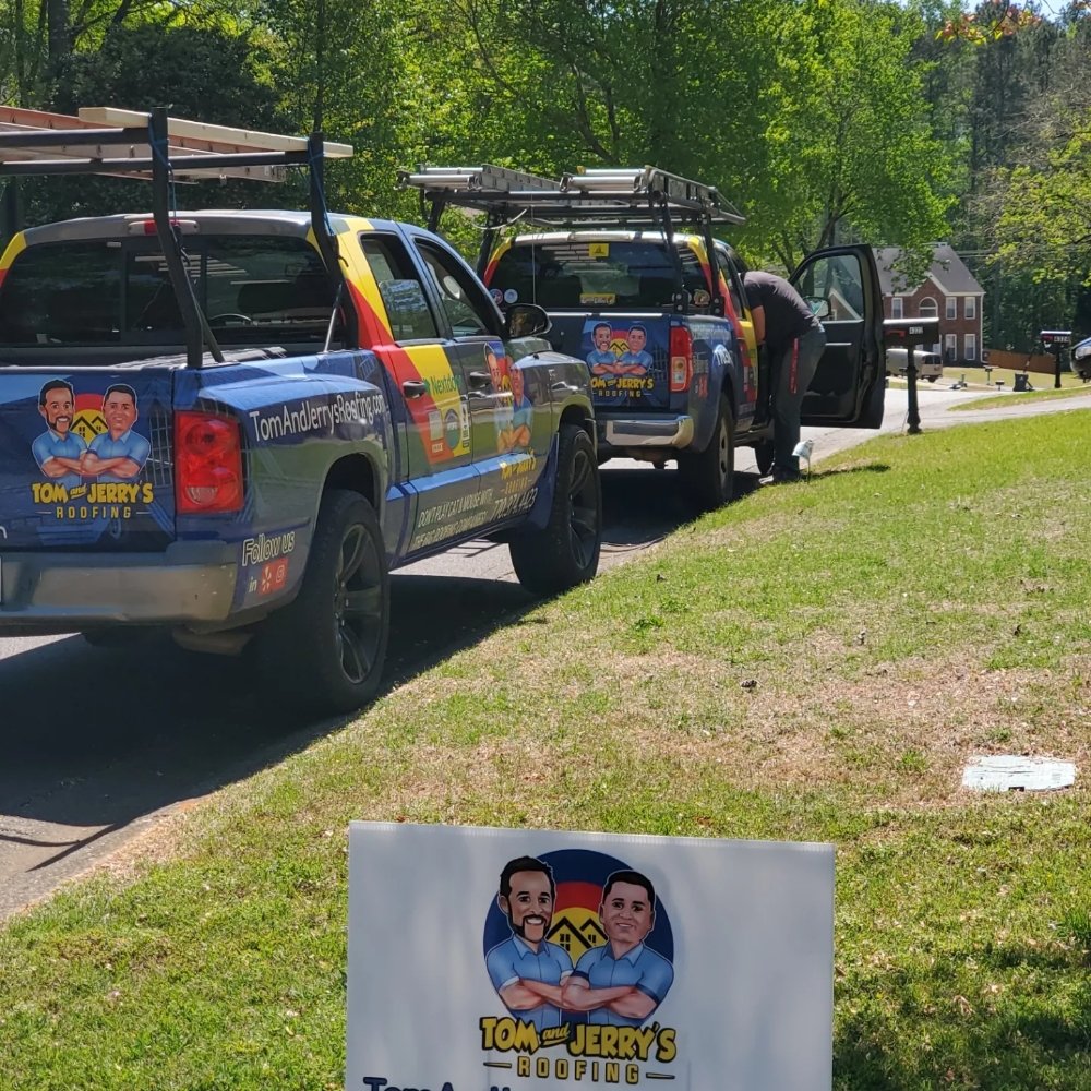 Slide of Tom and Jerry's Roofing