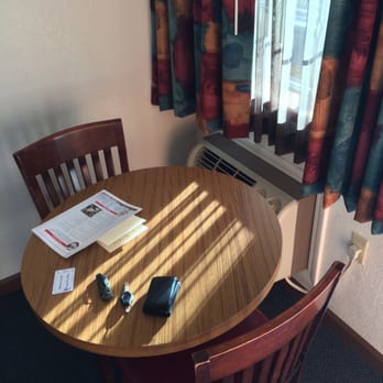 Economy Inn - Work area. Ac unit hidden behind table. - Hotels Near Me - Morgan Hill, California Economy Inn - Work area. Ac unit hidden behind table. - Hotels Near Me - Morgan Hill, California