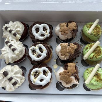 The Crimson Cake - Mini cupcake assortment: red velvet, white & black; s'more, and pistachio. - Custom Cakes Near Me - Oceanside, California