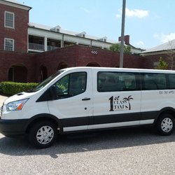 1st Class Taxi - 2015 Ford Transit 350, 14 passenger vehicle. It has YouTube and Netflix for your complete 1st Class Taxi experience.
