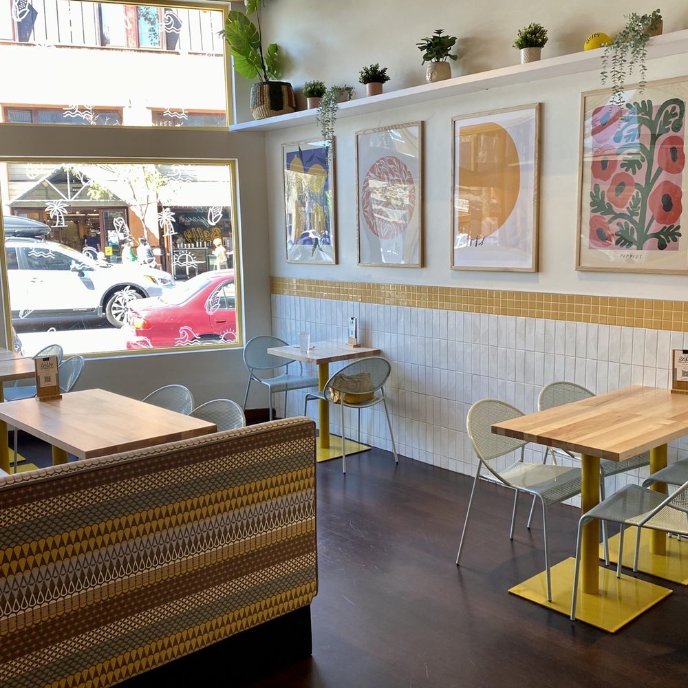 Belly - a view of a restaurant with tables and chairs - Mexican Near Me - Oakland, California