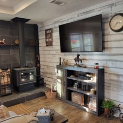 Mobile Home Liquidators - Our wood stove install, barnwood wall finish, and new entertainment center we buit.