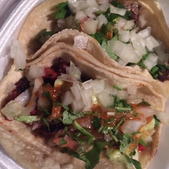 Tacos Lupita - Carne asada (steak) taco and roasted pork taco with guac, pico, lettuce, medium salsa, cilantro, onions, and lime on the side. - Mexican Near Me - Lowell, Massachusetts Tacos Lupita - Carne asada (steak) taco and roasted pork taco with guac, pico, lettuce, medium salsa, cilantro, onions, and lime on the side. - Mexican Near Me - Lowell, Massachusetts