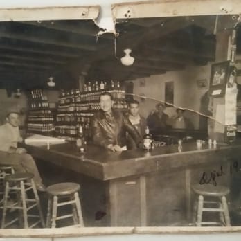 Silva's Saloon - Fèlix Silva, behind his bar, when it opened in Bernalillo.  April, 1934.  This is the oldest surviving bar in New Mexico. - Dive Bars Near Me - Bernalillo, New Mexico
