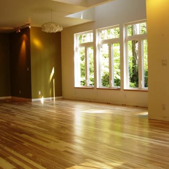 Natural Floors - an empty living room with wood floors - Flooring Near Me - Bremerton, Washington Natural Floors - an empty living room with wood floors - Flooring Near Me - Bremerton, Washington