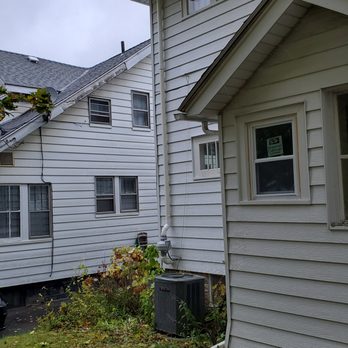 A Best Radon Systems - A Best Radon Systems - Radon vent goes under soffit and above roof. We try to group the radon fan with other utility appliances like A/C. - Home Inspectors Near Me - Manlius, New York