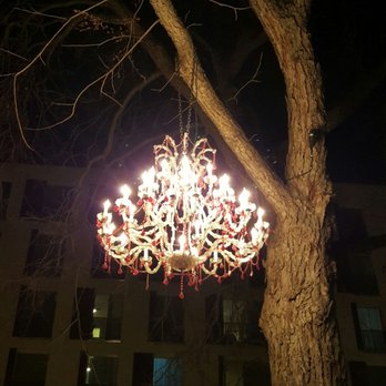 Hotel Ella - Chandelier over the seating area outside - Hotels Near Me - Austin, Texas Hotel Ella - Chandelier over the seating area outside - Hotels Near Me - Austin, Texas