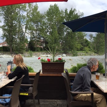 Creekside Pub & Grill - two people sitting at a table - American Near Me - Kelowna, British Columbia