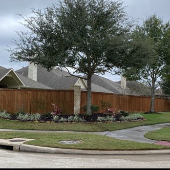 Water Baron Irrigation - East corner landscaped. - Irrigation Near Me