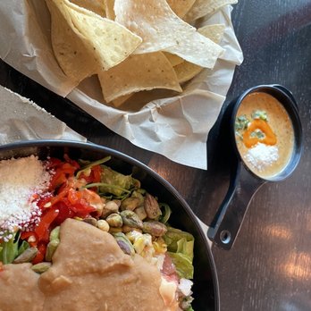 Torchy's Tacos - Salad with refried beans + queso n chips - Tacos Near Me - Houston, Texas Torchy's Tacos - Salad with refried beans + queso n chips - Tacos Near Me - Houston, Texas
