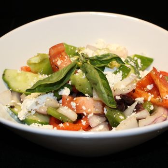 Pesto's - a salad in a white bowl - Italian Near Me - Sudbury, Ontario Pesto's - a salad in a white bowl - Italian Near Me - Sudbury, Ontario